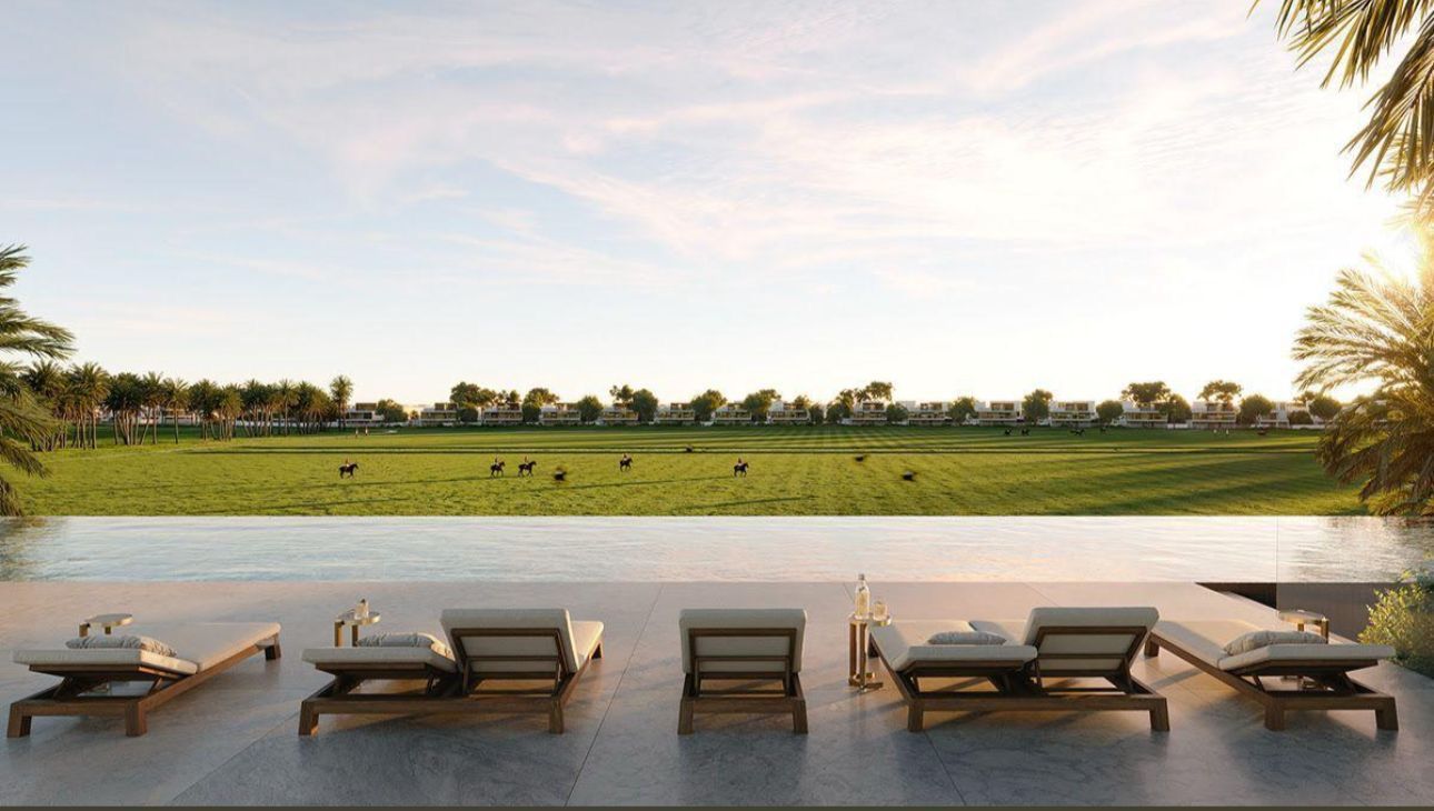 Sun loungers overlooking polo field